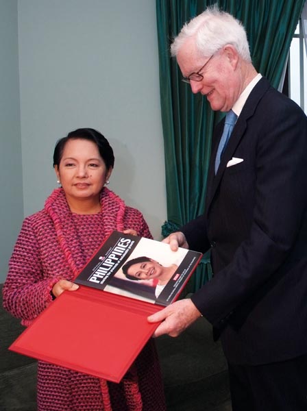 Rt Hon Lord Hurd of Westwell CH CBE PC presents the Special Report to HE President Gloria Macapagal-Arroyo of the Philippines