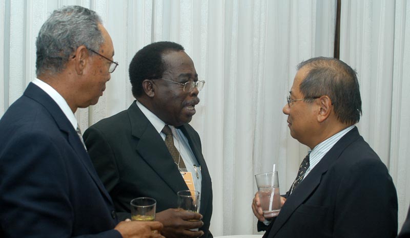 National Gas Company of Trinidad and Tobago (NGC) Chairman, Keith Awong, and President, Frank Look Kin, in discussion with Malcolm Jones, Executive Chairman  of Petrotrin