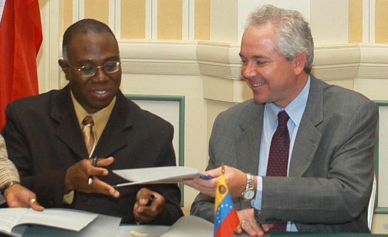 Eric Williams, Minister of Energy & Energy Industries of Trinidad and Tobago and Rafael Ramirez, Minister of Energy & Mines of Venezuela, sign a bilateral accord on data exchange