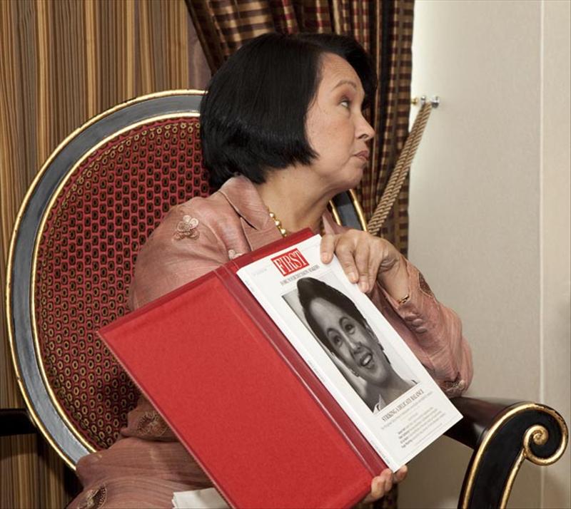 Rupert Goodman, Chairman and Founder of FIRST presents a leather-bound copy of FIRST to HE Gloria Macapagal-Arroyo, President of the Republic of the Philippines