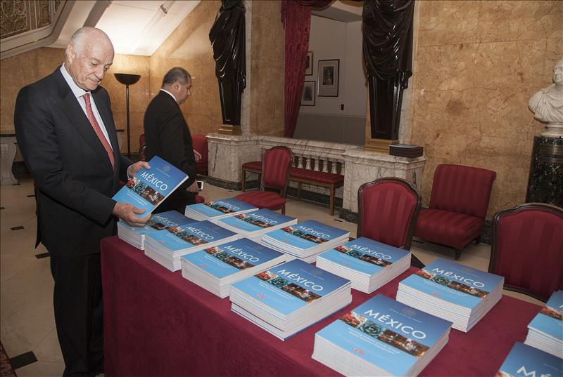 Ambassador Andrés Rozental, Founding President of the Mexican Council on Foreign Relations, persuses the official State Visit publication