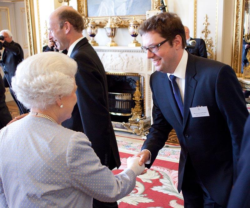 Alastair Harris, Executive Publisher and Editor of FIRST with HM Queen Elizabeth II at the Queen's Award Ceremony, Buckingham Palace