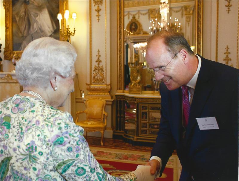 Eamonn Daly, Chief Operating Officer of FIRST with HM Queen Elizabeth II at the Queen's Award Ceremony, Buckingham Palace