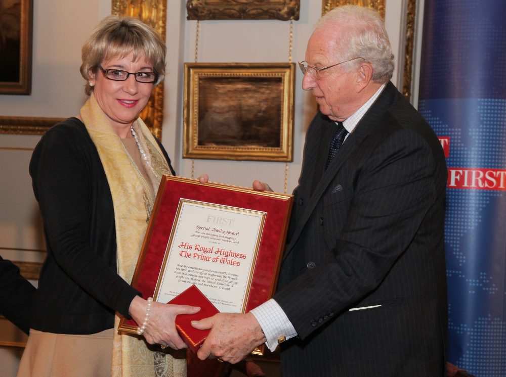Martina Milburn, Chief Executive Officer, The Prince's Trust, receives the Special Jubilee Award on behalf of HRH The Prince of Wales, from Lord Woolf, Chairman, FIRST Award Judging Panel